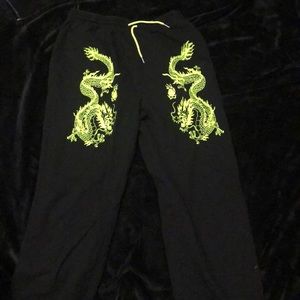 Black and neon green sweat pants